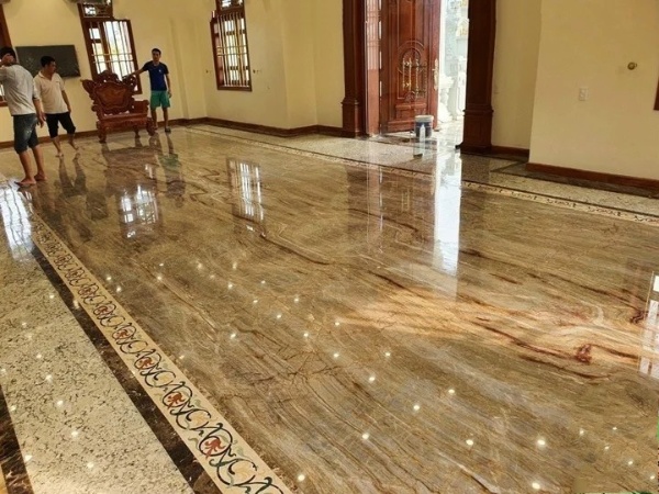 Sàn phòng khách lát đá thạch anh sáng bóng, sang trọng